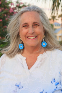 a woman smiling for the camera